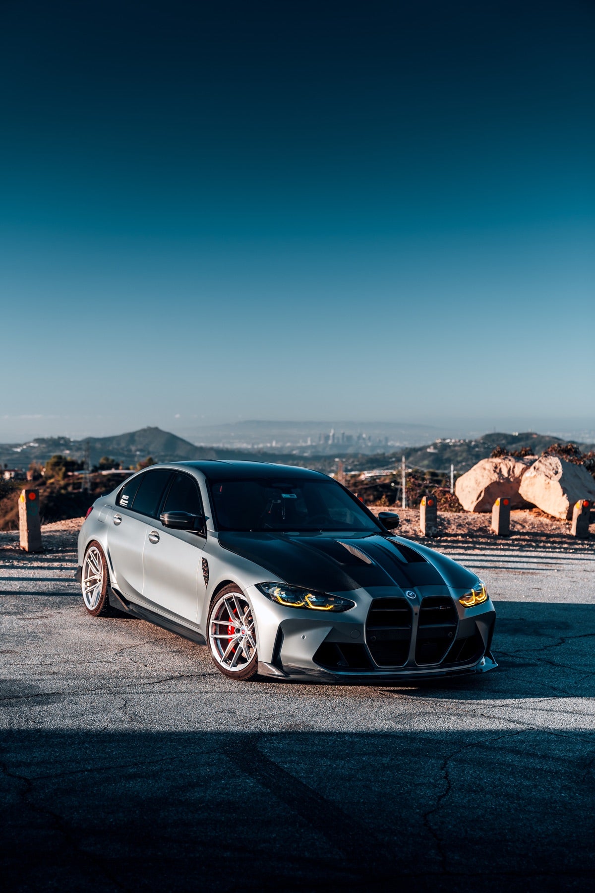 BMW G8X M3 front view with carbon fiber hood and aero parts